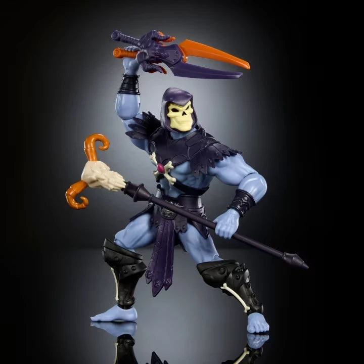 Masters of the Universe Skeletor action figure holding crossed swords above his head and staff in hand