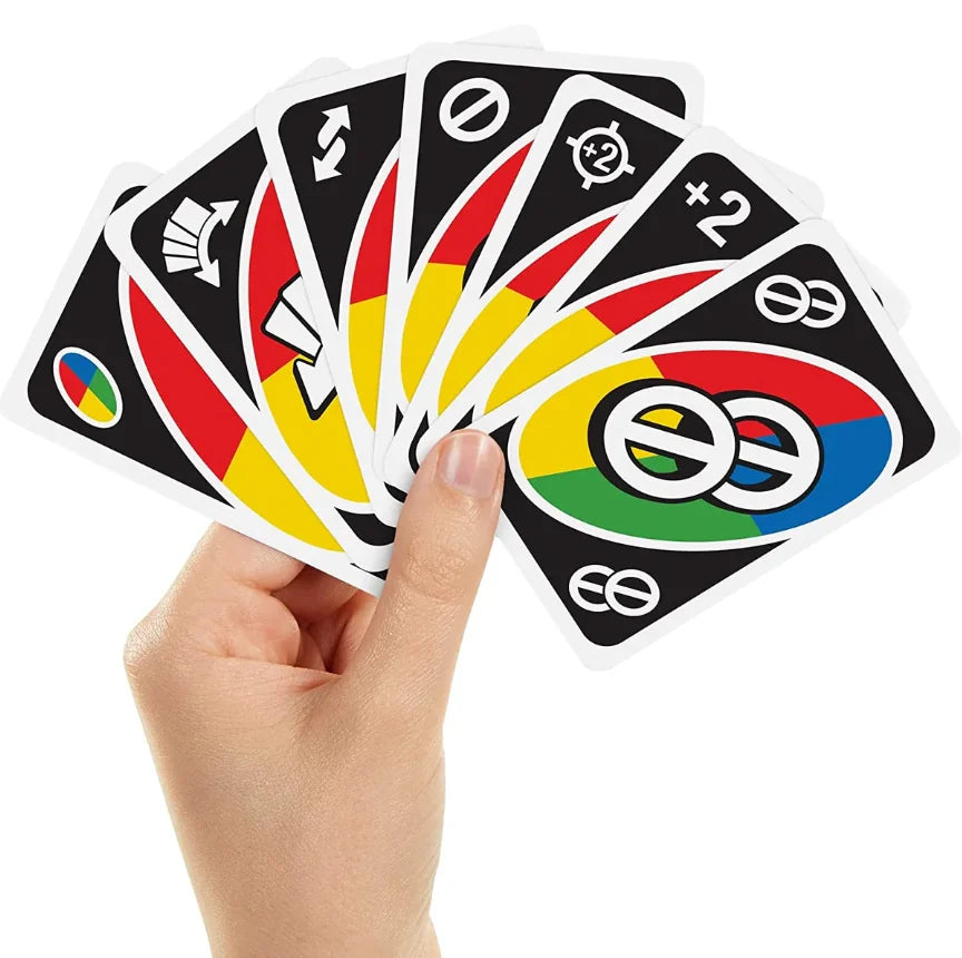 Hand holding UNO All Wild action cards including wild draw – Ireland