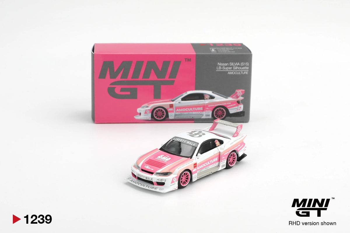 Mini GT Nissan Silvia S15 LB Super Silhouette Amoculture diecast car in pink and white racing livery with pink wheels, displayed in front of its illustrated Mini GT collector box