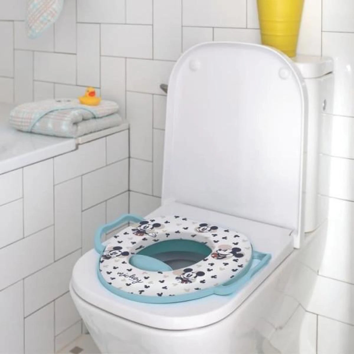 Mickey Mouse Soft Toilet Trainer fitted on a white toilet seat