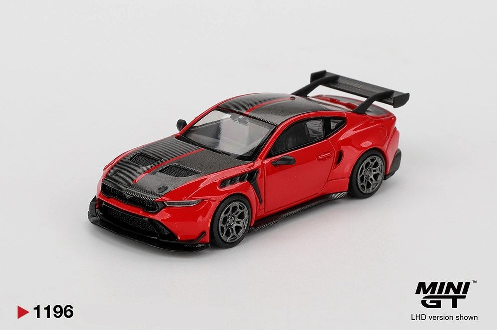 Front three-quarter view of Mini GT Ford Mustang GTD Race Red LHD showing the black bonnet and roof, red racing stripes, silver wheels, front splitter and large rear wing.