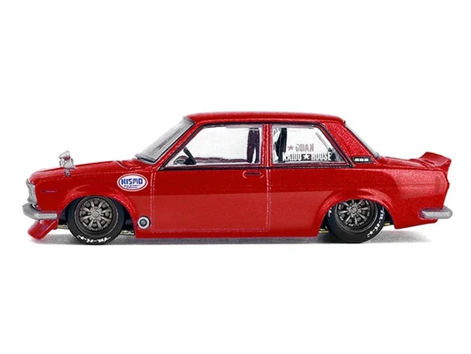 Mini GT x Kaido House Datsun 510 Street Nismo V3 side profile showing the red metallic body, Nismo graphics and alloy wheels