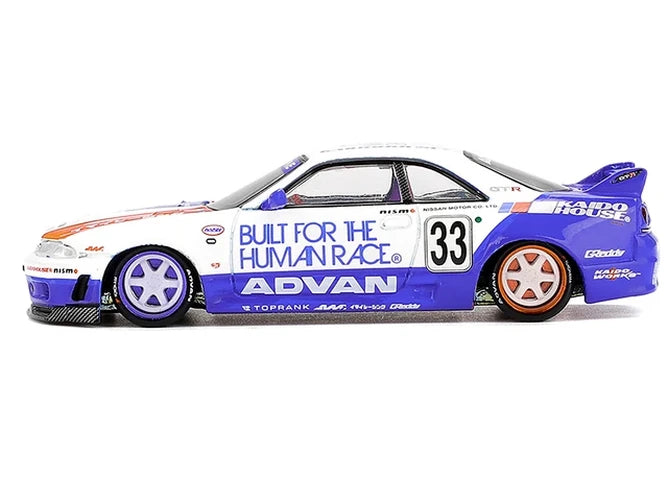 Mini GT x Kaido House Nissan Skyline GT-R R33 BFTHR V1 side profile showing number 33, Advan graphics and mismatched purple and bronze wheels