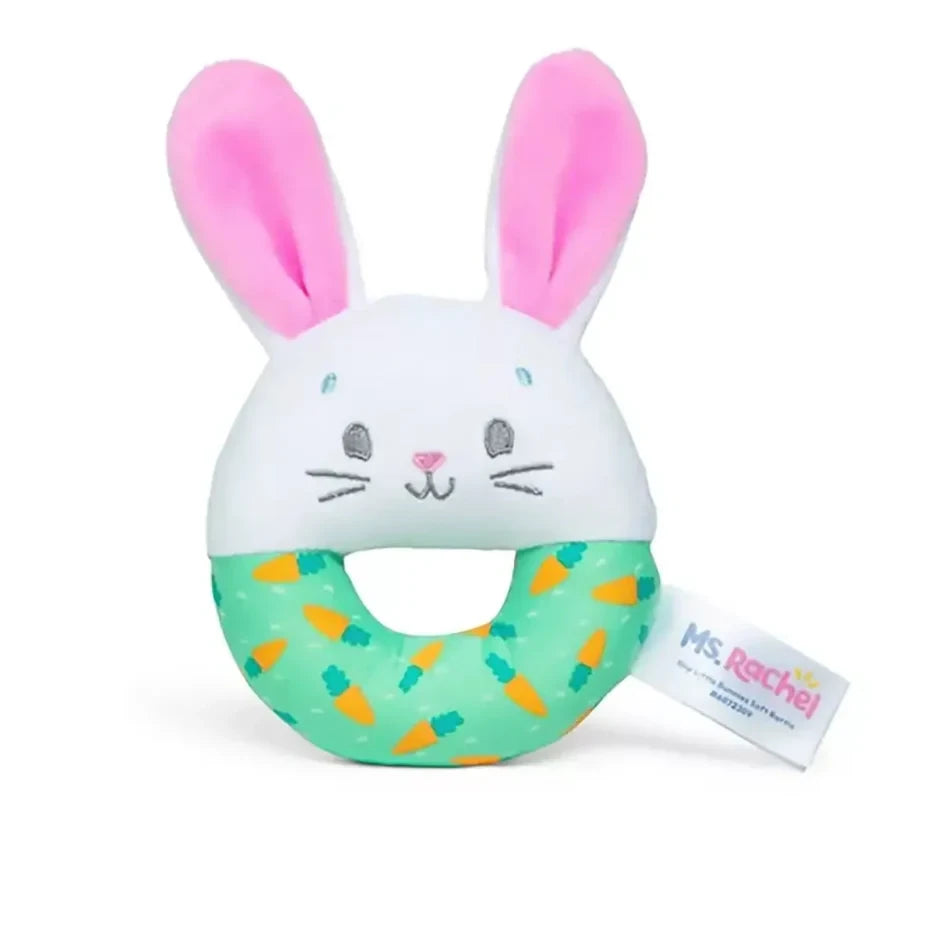 Ms. Rachel Hop Little Bunnies soft rattle with white bunny face, pink ears and green patterned ring