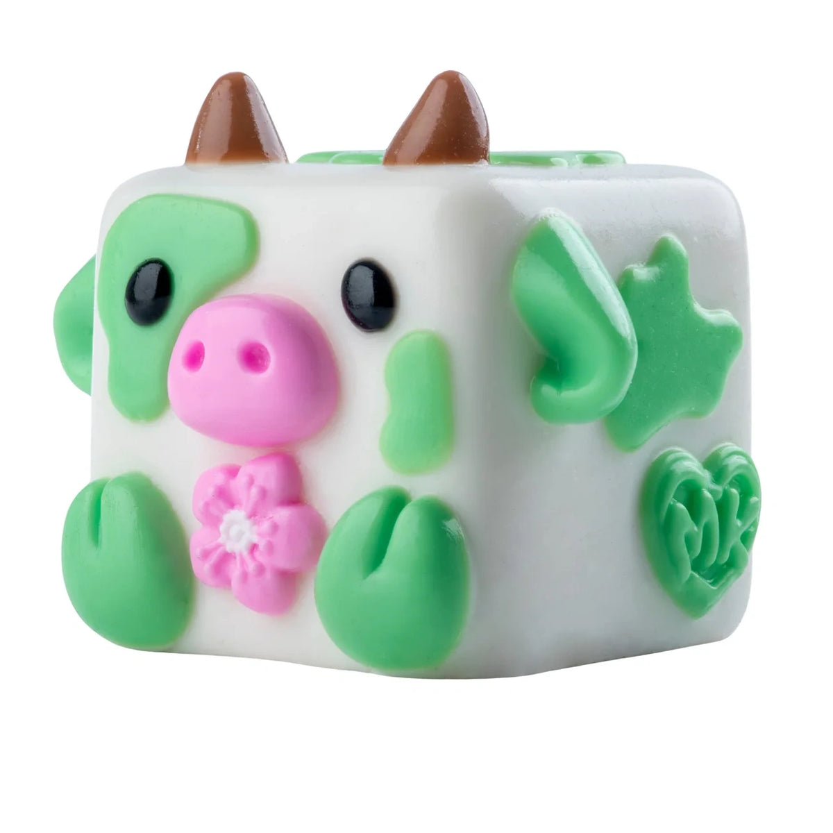 MushyKinz OG white and green cow Taba Squishy holding a pink flower