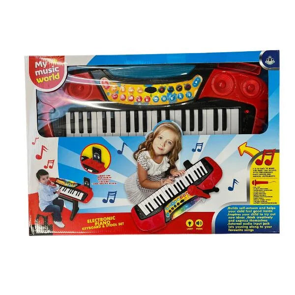 My Music World electronic keyboard in the retail box showing the keyboard layout microphone and stool