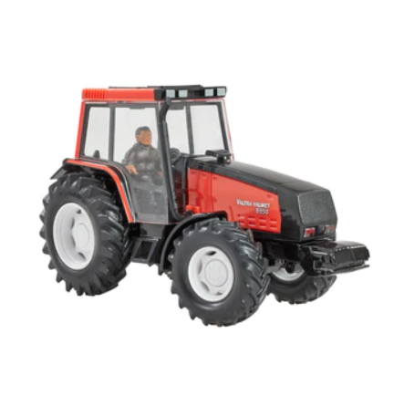 Britains Valtra Valmet 8950 tractor front side angle view with driver in cab inIreland.