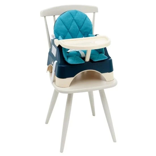 Oketi Poketi Wooded booster seat with tray shown on a white chair