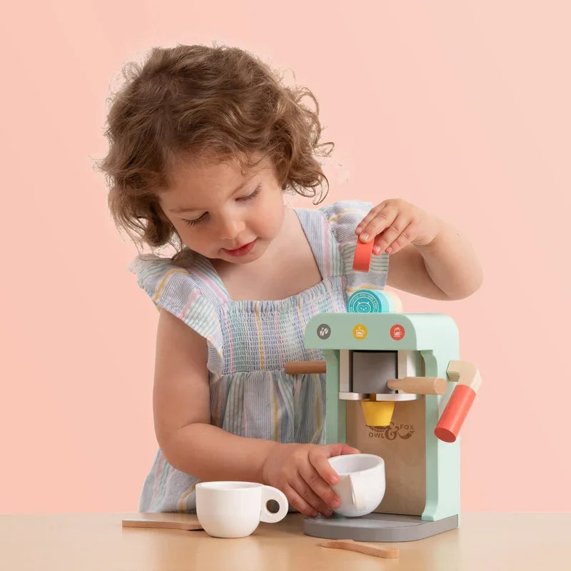 Child playing with Owl and Fox Wooden Coffee Machine toy – Ireland