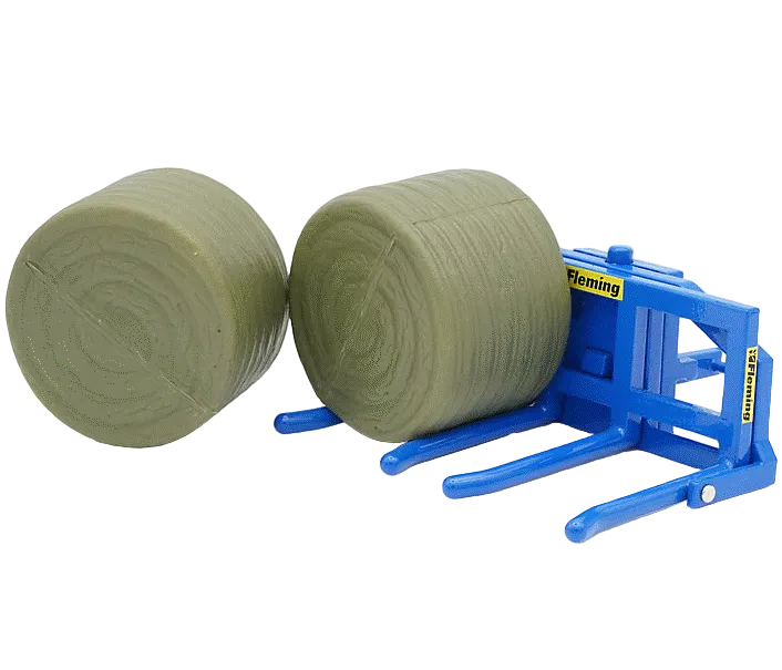 Britains Fleming Double Bale Lifter 1:32 with a blue body and two round bales shown on a white background.