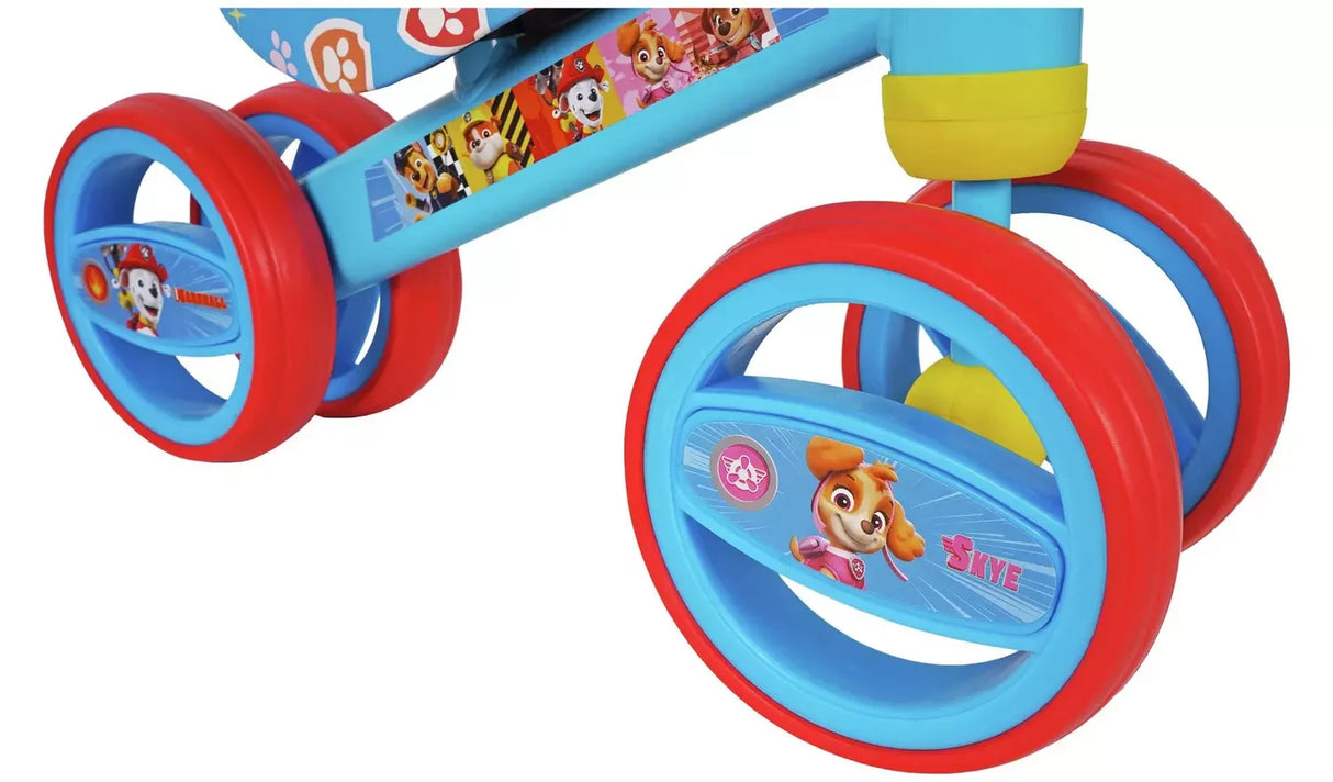 Close up of PAW Patrol Bobble Ride On front wheel, blue frame and character graphic