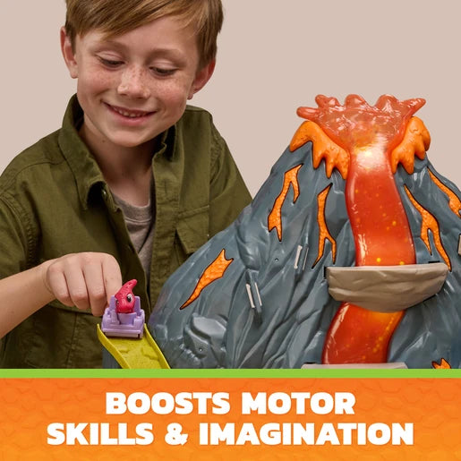 Child playing with a pink dinosaur figure beside the PAW Patrol Super Lava Blast volcano playset