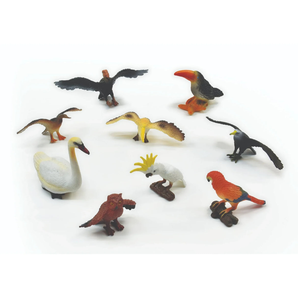 Nine bird figures arranged together, including white, red, black, brown and yellow birds in standing and wingspread poses