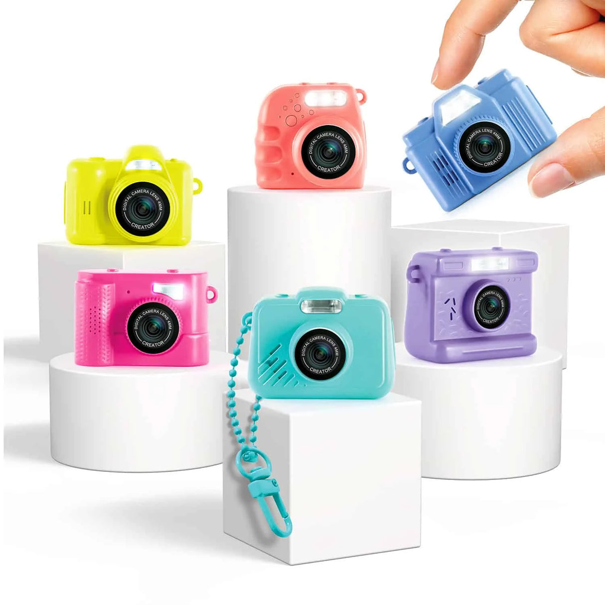 Collection of Photo Creator Mini Cam styles and colours displayed on stands in Ireland