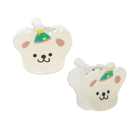 Princess Mimi hair clip with a cream face and green party hat, shown from the front and side.
