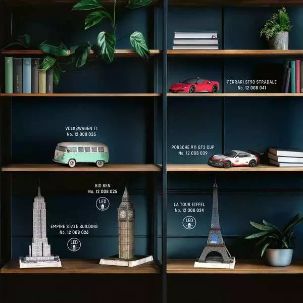 Ravensburger 3D Puzzle Iconics range display showing landmark and vehicle models including Big Ben, Eiffel Tower and Empire State Building