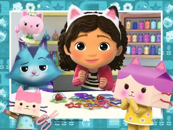 Gabby at a craft table with three cartoon cats in Ravensburger Gabby's Dollhouse Puzzle 4 In a Box