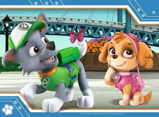 Paw Patrol characters Rocky and Skye smiling outdoors with flowers and a butterfly from Ravensburger puzzle scene