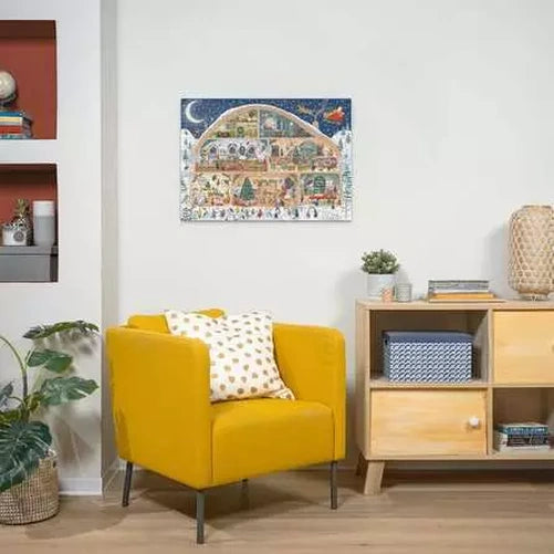Completed Ravensburger Santa's Workshop puzzle displayed on a wall above a yellow armchair and shelving unit
