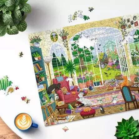Ravensburger Summer Garden Parlour 1000 Piece jigsaw puzzle partly assembled on a table with loose pieces around it