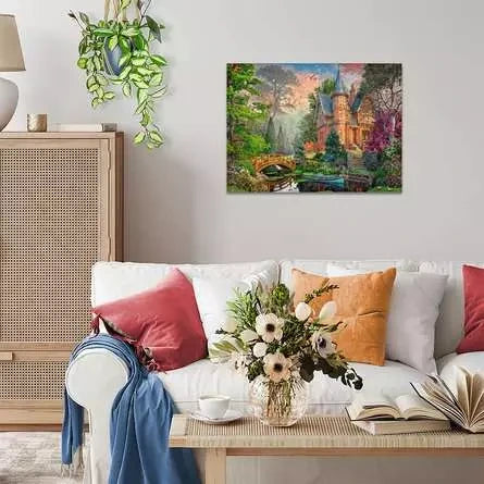 Completed Ravensburger Terracotta Mansion 1000 Piece puzzle displayed on a wall above a sofa