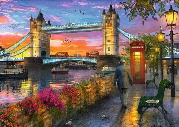 Ravensburger Tower Bridge at Sunset puzzle artwork showing Tower Bridge, a red telephone box, riverside path, flowers and a colourful evening sky