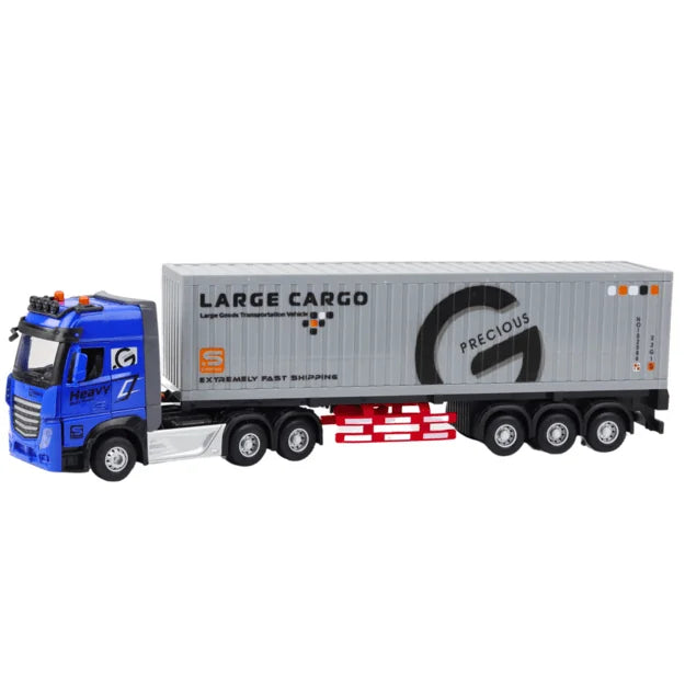 Blue remote controlled transport truck with long cargo container on a white background