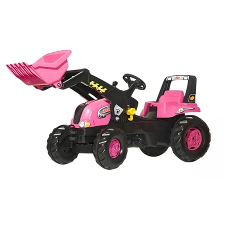 Rolly Junior pink pedal tractor front-left angle with raised pink loader bucket and black steering wheel – Ireland