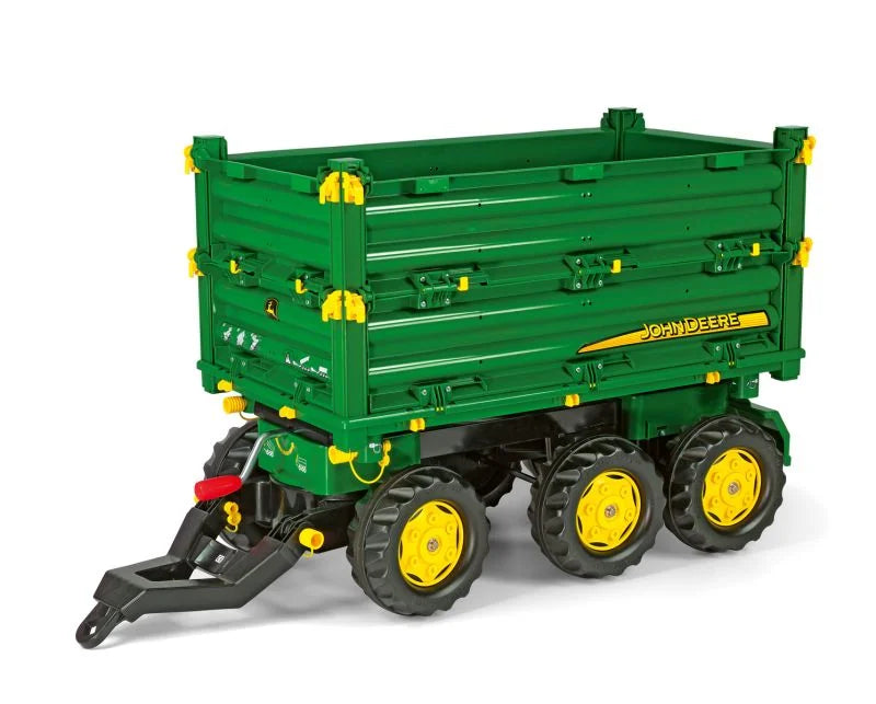 Green Rolly Multi Trailer John Deere with three axles and foldable side panels shown on a white background.