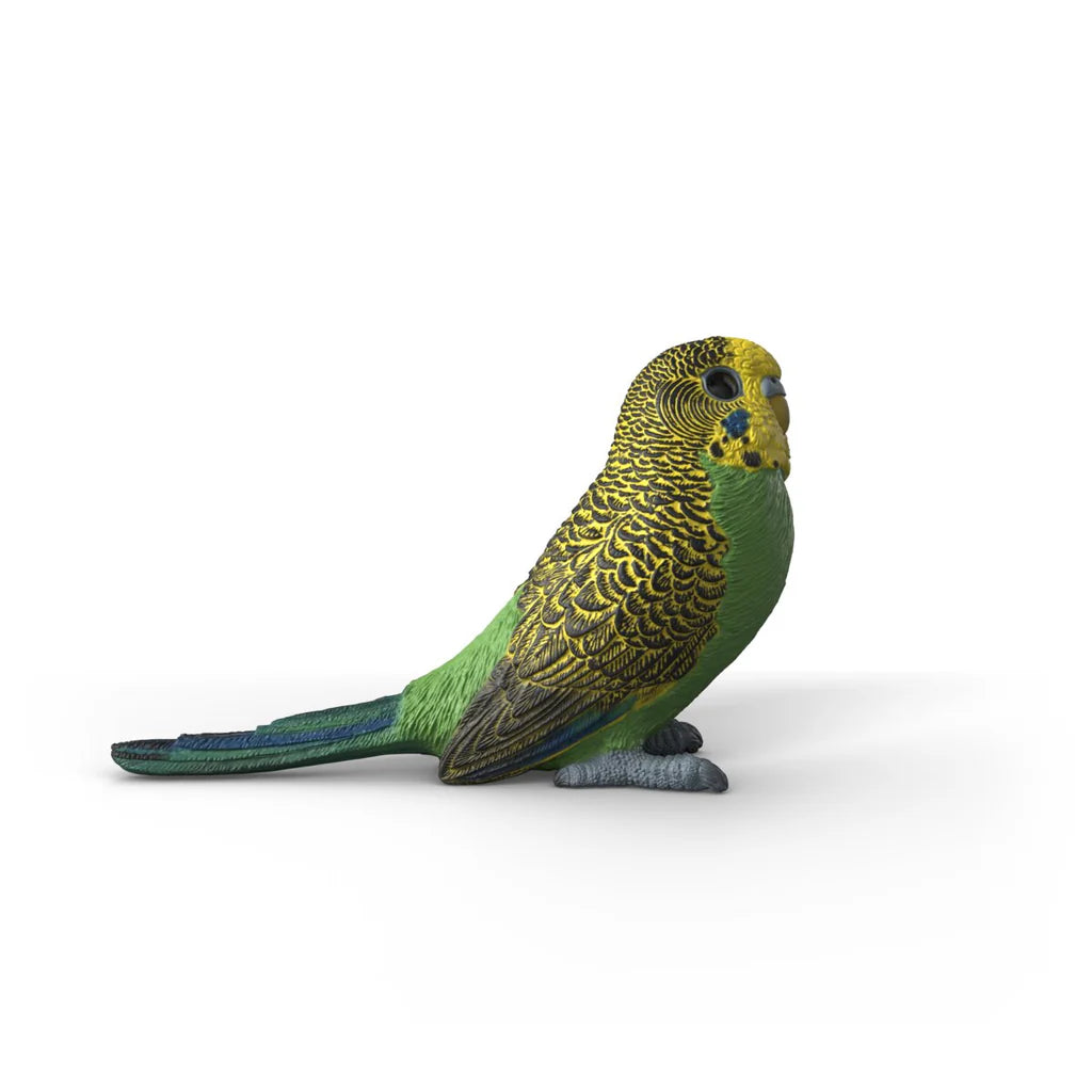 Schleich Budgie 14939 right side view showing the yellow face, green chest, patterned wing and long tail