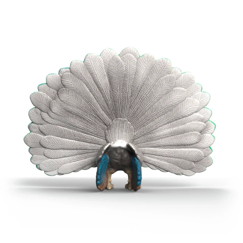 Left side view of the Schleich Peacock figure with its tail feathers spread