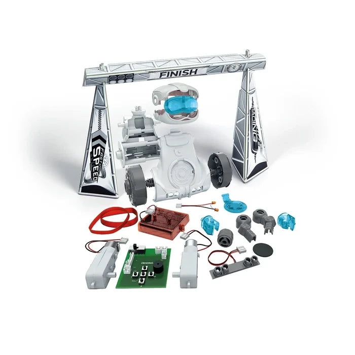 Partially assembled Mio robot and loose components arranged beside a finish gate.