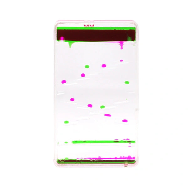 Sensory Motion Bubbler Stair with green and pink droplets descending through a clear rectangular container
