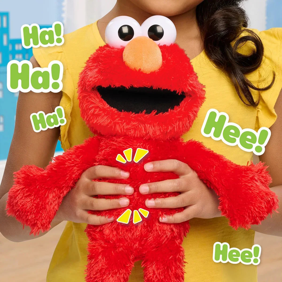 Girl tickling Elmo’s tummy to make the Tickle Me Elmo plush laugh and shake – Ireland.