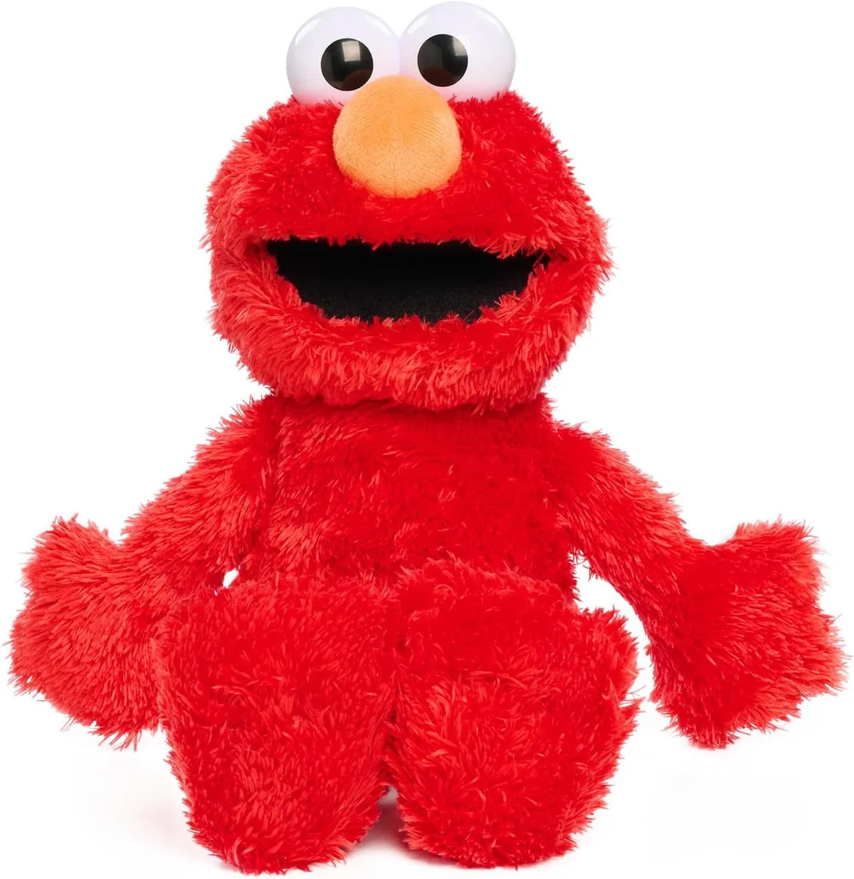 Sesame Street Tickle Me Elmo plush with big eyes and red fur sitting upright – Ireland.