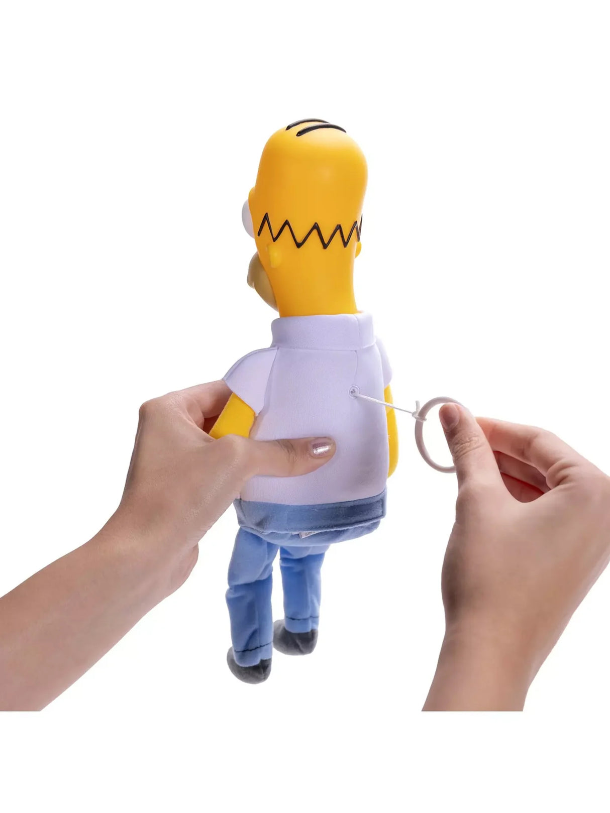 Back view of Homer Shelf Talker plush with hand pulling the string to activate voice feature in Ireland