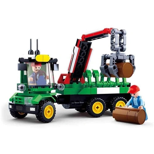 Sluban Log Trailer Large shown from the front side with green cab, six wheels, raised red crane, grey claw holding a brown log and worker figure beside the vehicle