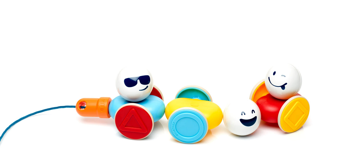 Three separate SmartMax My First Wobbly Cars pieces with red, blue and yellow wheels