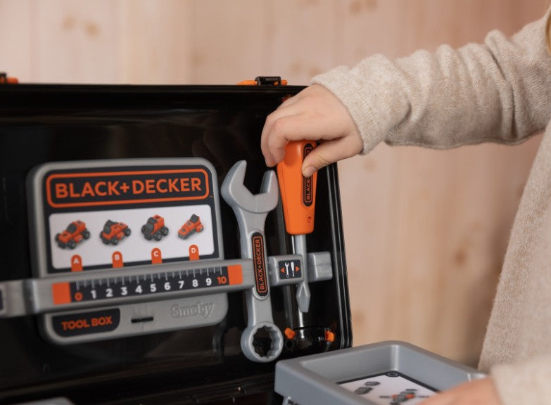 Close-up of toy wrench and screwdriver in Black+Decker toolbox – Ireland
