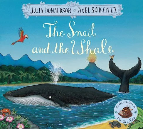 Book cover of The Snail and the Whale with whale in a bay and a parrot flying by Julia Donaldson & Axel Scheffler in Ireland
