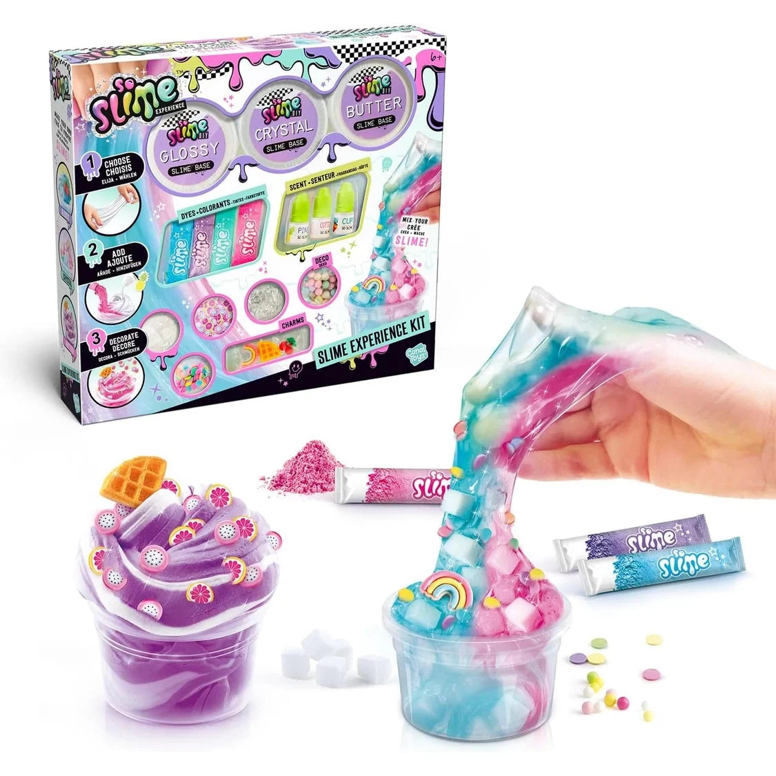 So Slime Experience Kit retail box displaying glossy, crystal and butter slime bases, coloured dyes, scents and decorations, beside two pots of decorated purple and pink slime, with a hand stretching blue and pink slime.