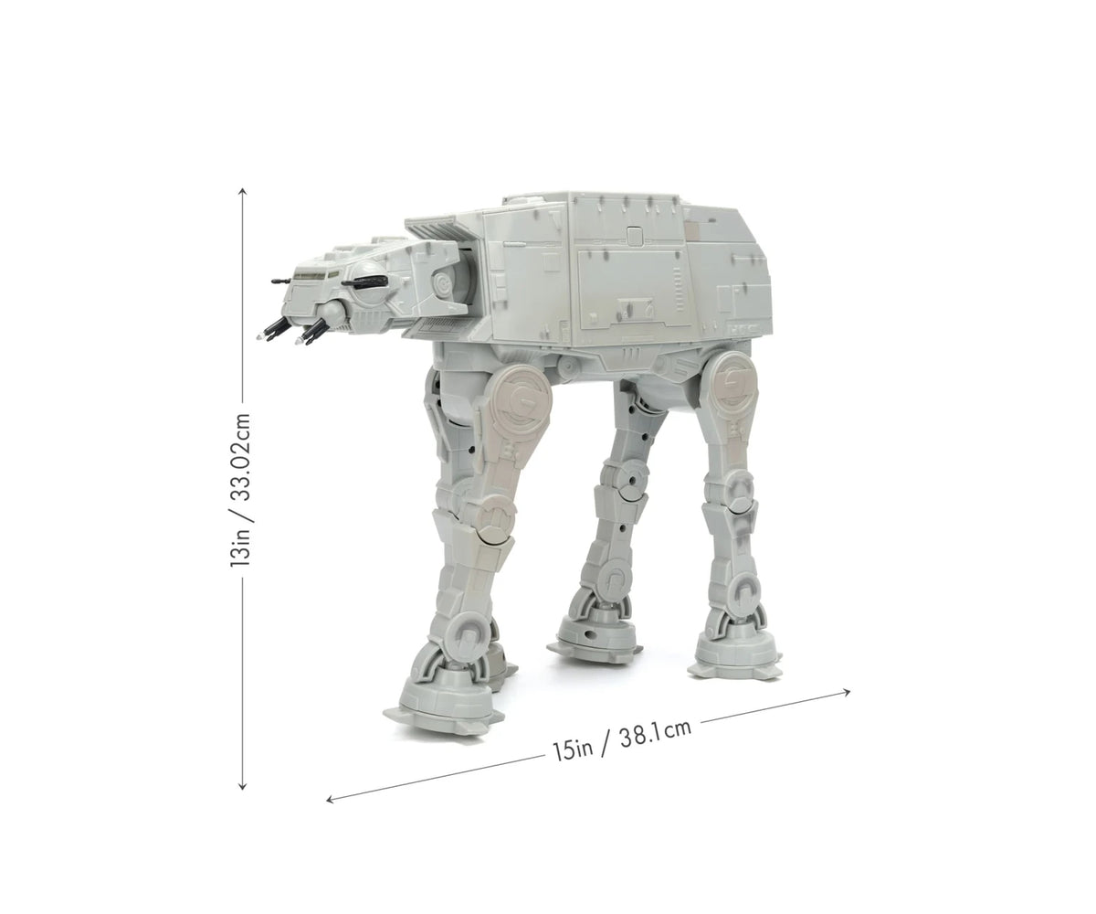 Star Wars RC Walking AT-AT dimensions diagram showing the grey four legged walker measuring 33.02 cm high and 38.1 cm long.