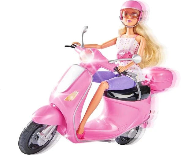 Steffi Love doll seated on the pink scooter facing forward, wearing a pink helmet and sunglasses, shown from a front-facing angle