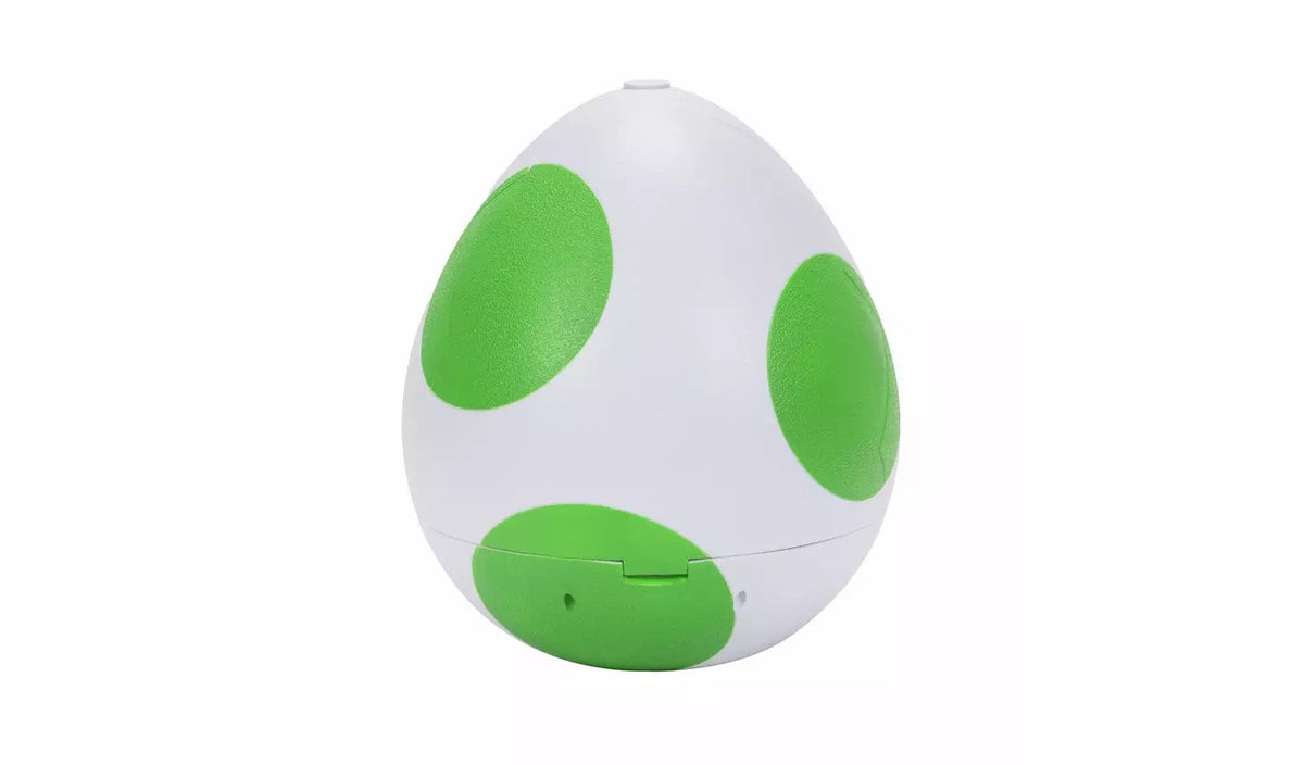 Super Mario Galaxy Movie Yoshi Egg Playset completely closed, showing the white egg with three large green spots against a plain white background.
