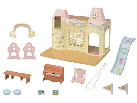 Sylvanian Families Baby Castle Nursery accessories including piano, slide, chairs, flags, and rainbow arch in Ireland.