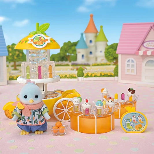 Blue bird figure shown with a yellow juice stand, orange counter and small drink accessories