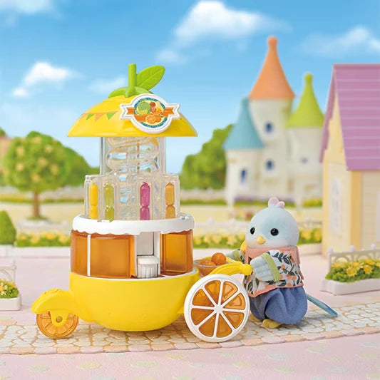 Yellow Sylvanian Families juice wagon shown beside a blue bird figure in a village scene
