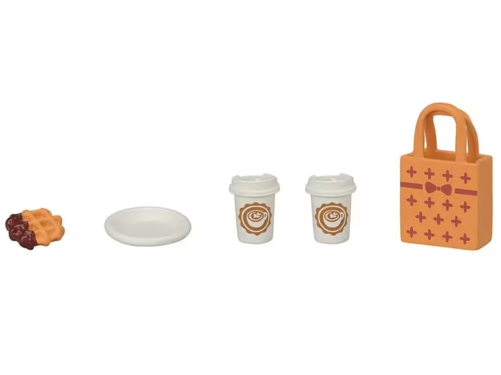 Small food pieces, plate, two takeaway cups and shopping bag shown on a white background