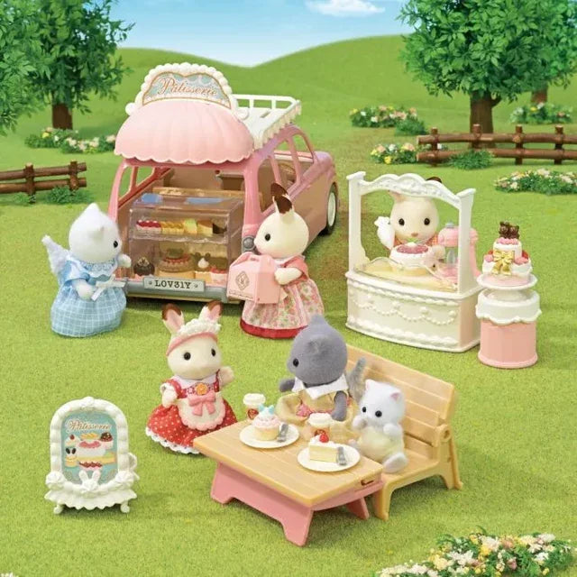Sylvanian Families Cake Shop play scene with animal figures serving and eating cakes