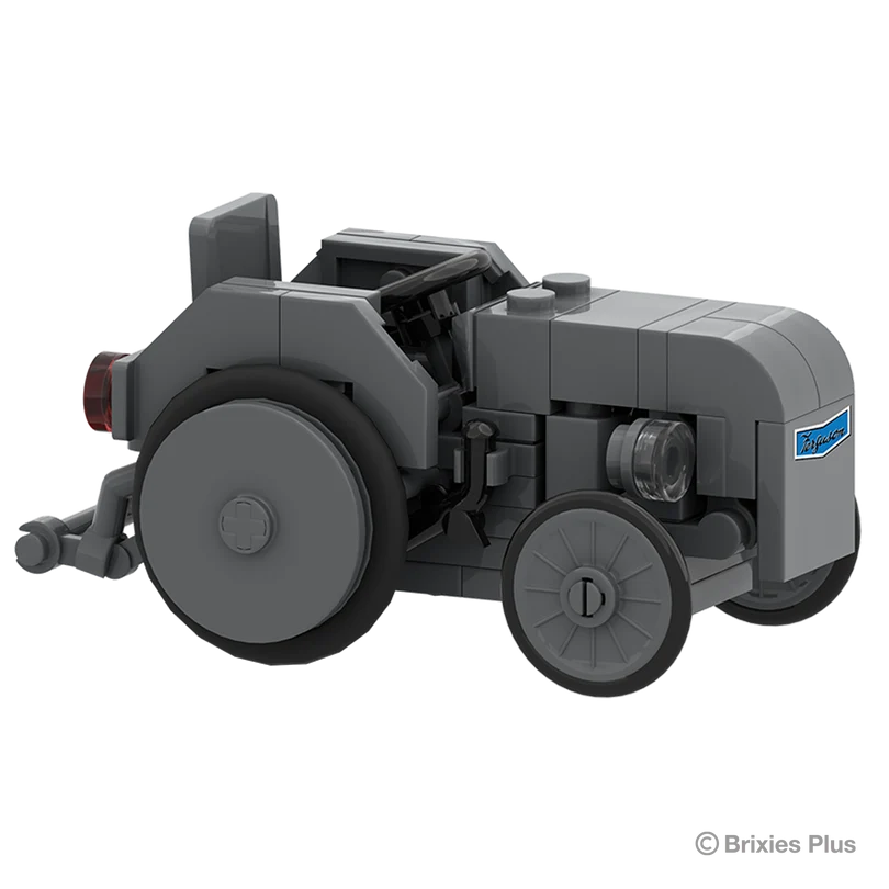 BRIXIES Plus Massey Ferguson TEA 20 Mini viewed from the front right showing the grey bonnet, headlamp, Ferguson badge and rear wheel